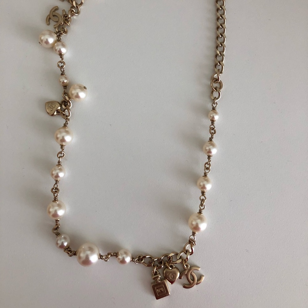 Authenic Chanel gold charm necklace